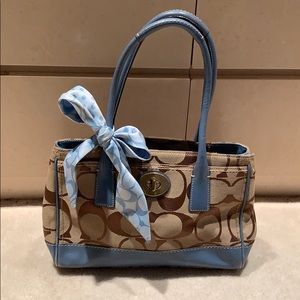 Coach purse with bow